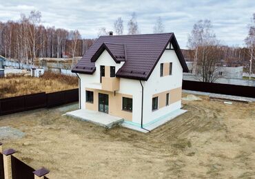 Стильный дом с мансардным этажом в КП 