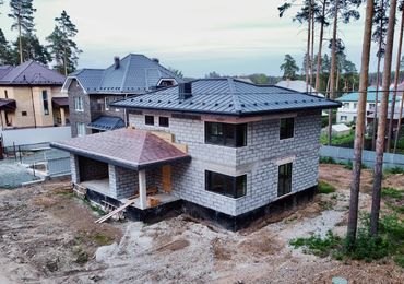 Двухэтажный дом с гаражом на две машины в городе Березовском